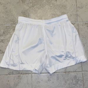 White Nike shorts